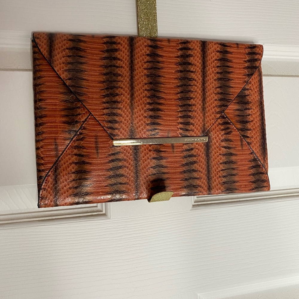 BCBG Orange and Black Clutch Like New